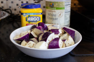 Toss eggplant with corn starch and white vinegar