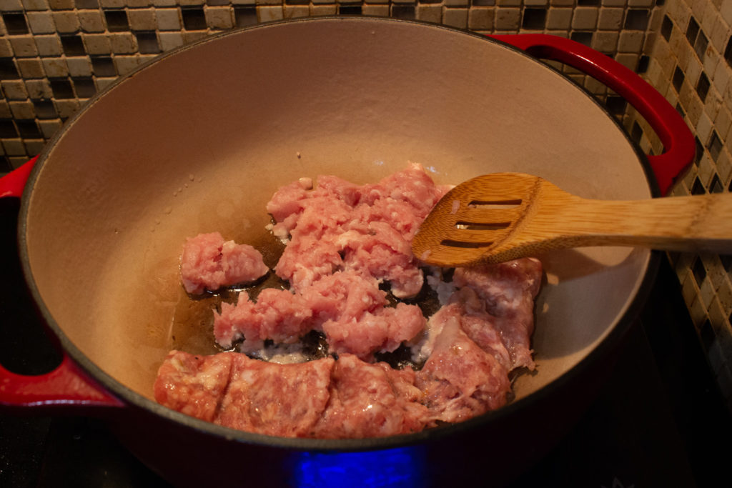 Browning ground pork in a Dutch oven